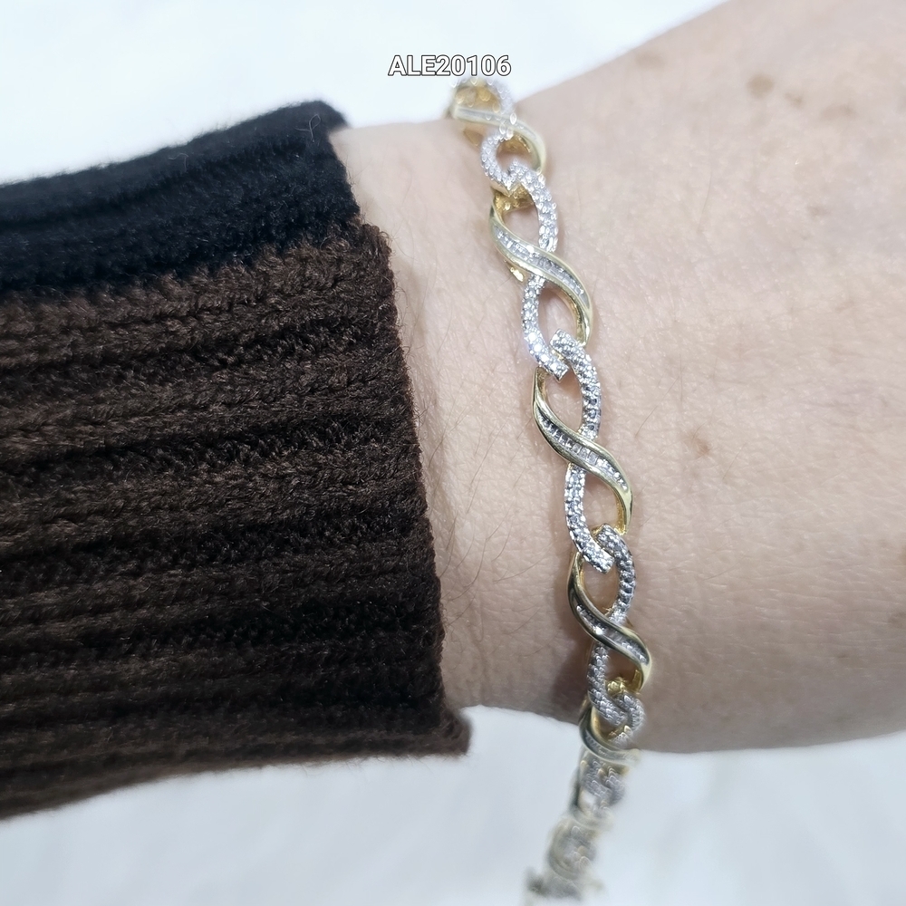 Sterling Silver 925 Gold-tone silver bracelet featuring an infinity design